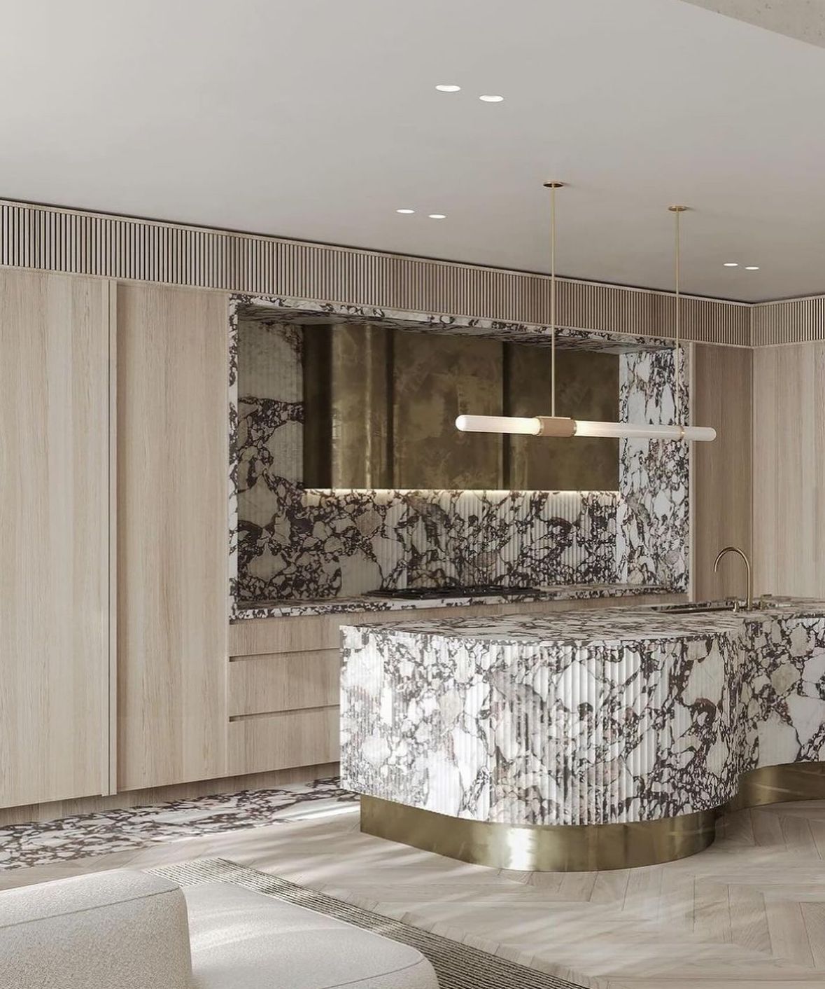 sleek modern kitchen with gloss white cabinets, large island, gold handles, stainless steel appliances