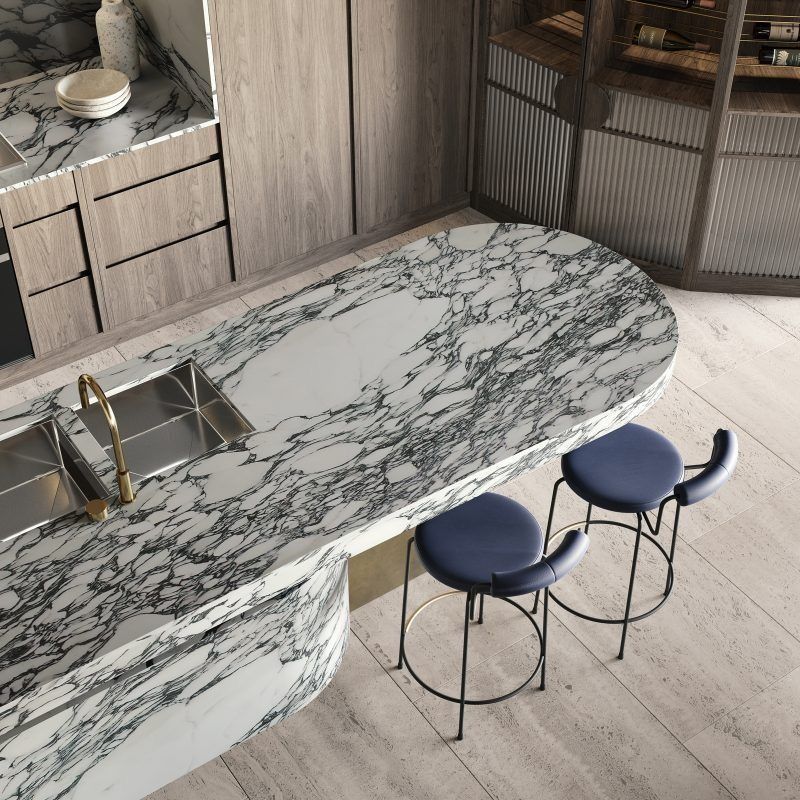 Minimalist kitchen with clean lines, flat-panel cabinets, and a monochromatic color scheme